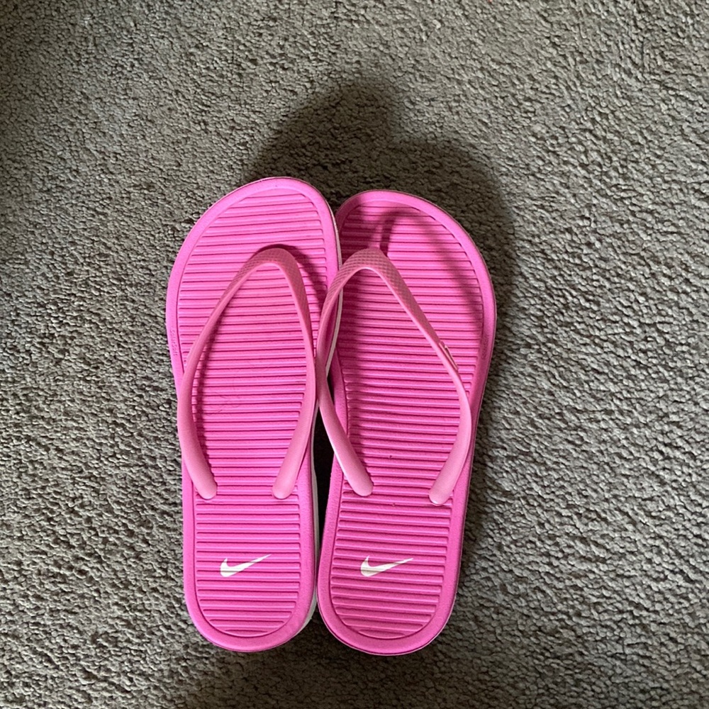 Gently worn Pink Nike sandals